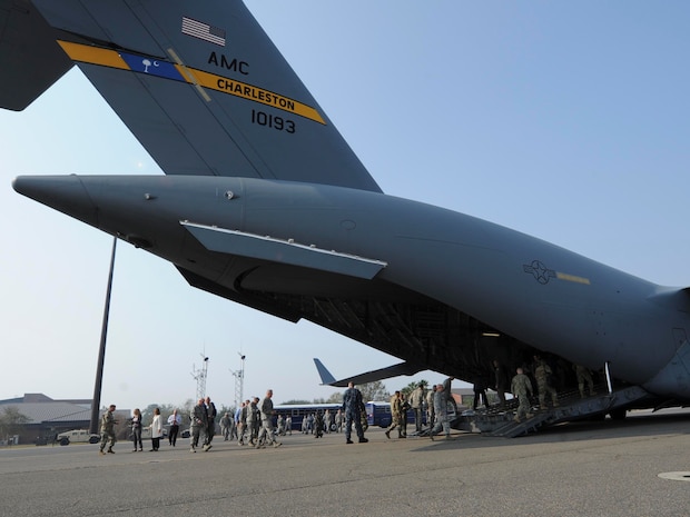 Key leaders from U.S. Transportation Command (USTRANSCOM) board a C-17 Globemaster III for a sortie during the USTRANSCOM Component Commanders conference here, Nov. 15, 2016. McDew and other key leaders from USTRANSCOM met to discuss common themes across the command.