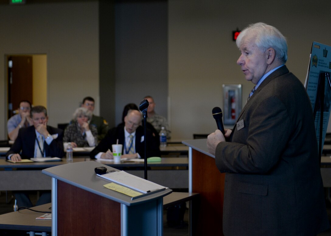 Warren Hendricks, manager of the northwest mountain region of the Aircraft Owners and Pilots Association, speaks to members of the Powder River Council during a meeting in the deployment center at Ellsworth Air Force Base, S.D., Nov. 16, 2016. Hendricks has nearly 20 years of experience as a military pilot, flying the A-7 Corsair and the F-16 Fighting Falcon. (U.S. Air Force Photo by Senior Airman Rebecca Imwalle)