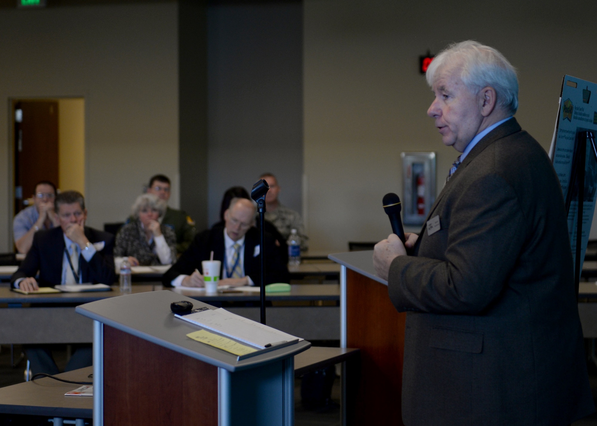 Warren Hendricks, manager of the northwest mountain region of the Aircraft Owners and Pilots Association, speaks to members of the Powder River Council during a meeting in the deployment center at Ellsworth Air Force Base, S.D., Nov. 16, 2016. Hendricks has nearly 20 years of experience as a military pilot, flying the A-7 Corsair and the F-16 Fighting Falcon. (U.S. Air Force Photo by Senior Airman Rebecca Imwalle)