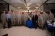 Lt. Gen. Michelle Johnson (center left), the superintendent of the U.S. Air Force Academy, and Dr. Jim Knowlton, the director of the Academy's Athletics Department (center right), stand besides the Commander-in-Chief's Trophy Nov. 17, 2017, in Mitchell Hall.  Johnson presented the trophy to the Cadet Wing from the Staff Tower during a long round of applause from cadets. Standing with Johnson and Knowlton are Falcon Football head coach Troy Calhoun, members of the Air Force Falcons, and Brig. Gen. Stephen Williams, the commander of the Cadet Wing. (U.S. Air Force photo/Darcie Ibidapo)
