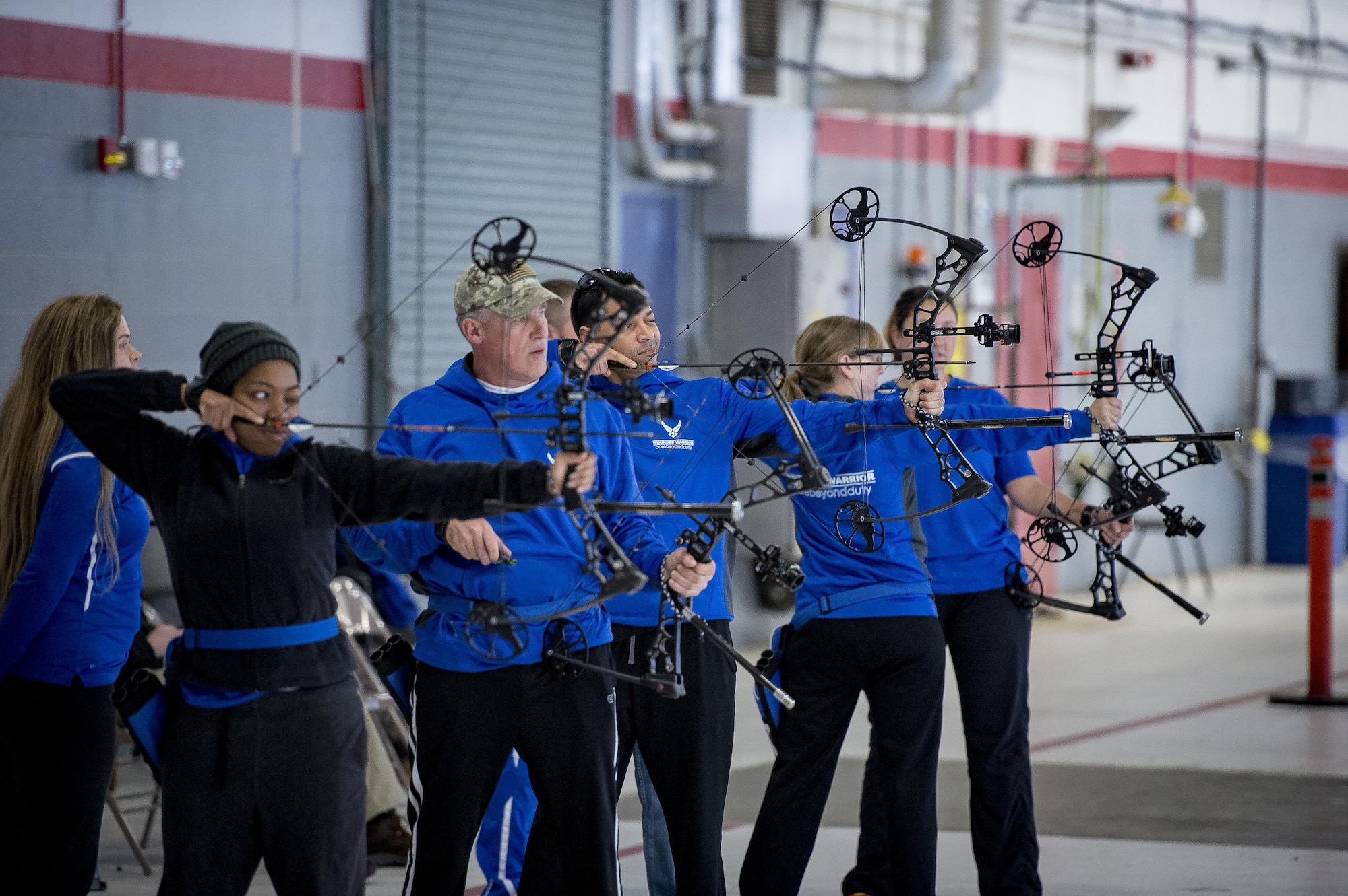 Participants of the Air Force Wounded Warrior Program’s Northeast Warrior CARE Event shoot archery on Joint Base Andrews, Md., Nov. 18, 2016. The AFW2 regional CARE event provided a holistic opportunity for wounded warriors to enhance the four domains -- physical, mental, spiritual and social – of Comprehensive Airman Fitness. (U.S. Air Force photo/Staff Sgt. Christopher Gross)