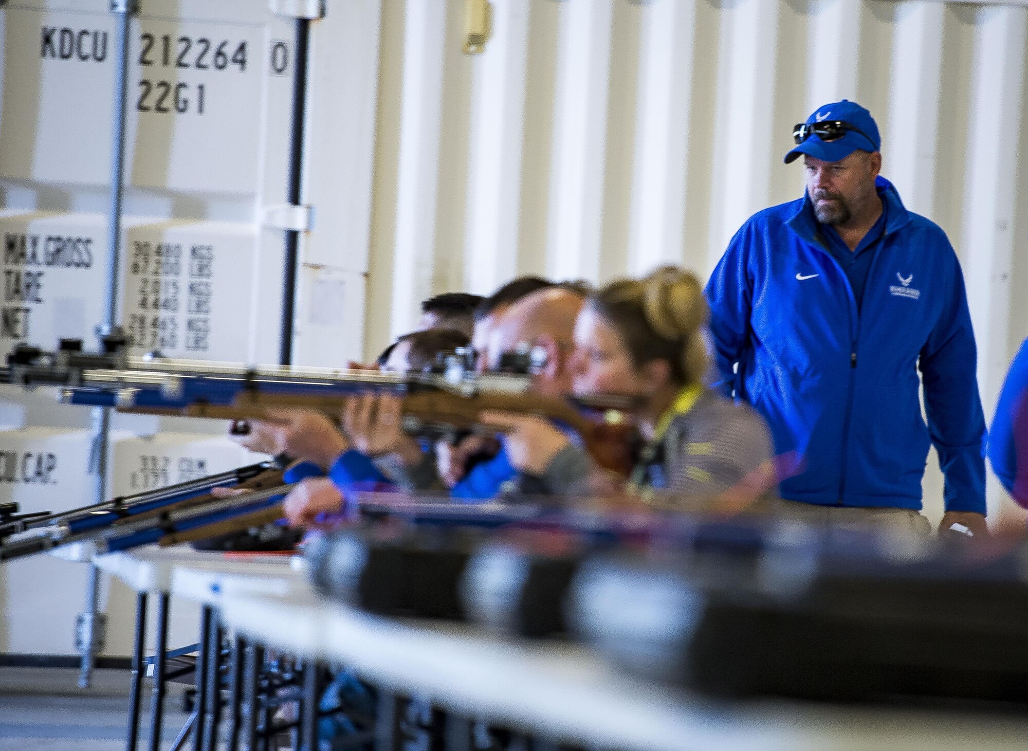 Dan Duitsman, the Air Force Wounded Warrior Program shooting head coach, watches as participants fire air rifles at the Northeast Warrior CARE Event on Joint Base Andrews, Md., Nov. 18, 2016. The AFW2 regional CARE event provided a holistic opportunity for wounded warriors to enhance the four domains -- physical, mental, spiritual and social – of Comprehensive Airman Fitness. (U.S. Air Force photo/Staff Sgt. Christopher Gross)