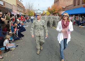 940th Air Refueling Wing commander, Col. Craig C. Peters and his wife, Cathie, lead members of the 940 ARW in the Yuba-Sutter Veterans Day parade on Nov. 11, 2016 in Marysville, California. This is the 14th year Marysville has hosted a parade honoring our Nation’s veterans who have served and are serving in the Armed Forces. (U.S. Air Force photo by Sean Bhakta)