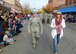 940th Air Refueling Wing commander, Col. Craig C. Peters and his wife, Cathie, lead members of the 940 ARW in the Yuba-Sutter Veterans Day parade on Nov. 11, 2016 in Marysville, California. This is the 14th year Marysville has hosted a parade honoring our Nation’s veterans who have served and are serving in the Armed Forces. (U.S. Air Force photo by Sean Bhakta)