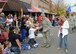 A child from the audience holds out his hand to 940th Air Refueling Wing commander, Col. Craig C. Peters for a shake at the 14th Annual Yuba-Sutter Veterans Day parade on Nov. 11, 2016 in Marysville, California. Hundreds of community members took the parade as an opportunity to thank Team Beale who marched in it and pay their respects to all veterans. (U.S. Air Force photo by Sean Bhakta)