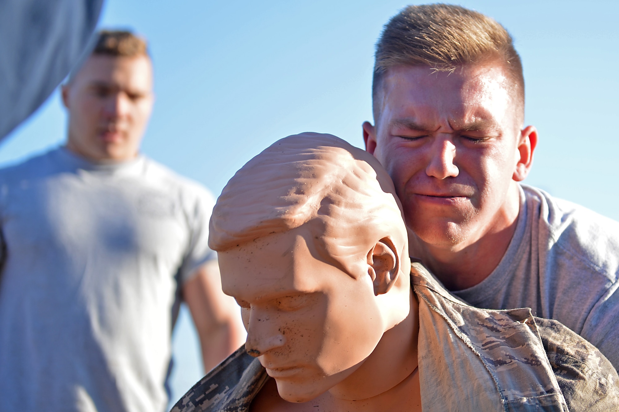 A U.S. Airman assigned to the 20th Civil Engineer Squadron transports a simulated injured wingman during a Firefighter Combat Challenge 5K run at Shaw Air Force Base, S.C., Nov. 18, 2016. Participants were tasked with transporting the almost 250 pound mannequin approximately 100 meters. (U.S. Air Force photo by Airman 1st Class Christopher Maldonado)