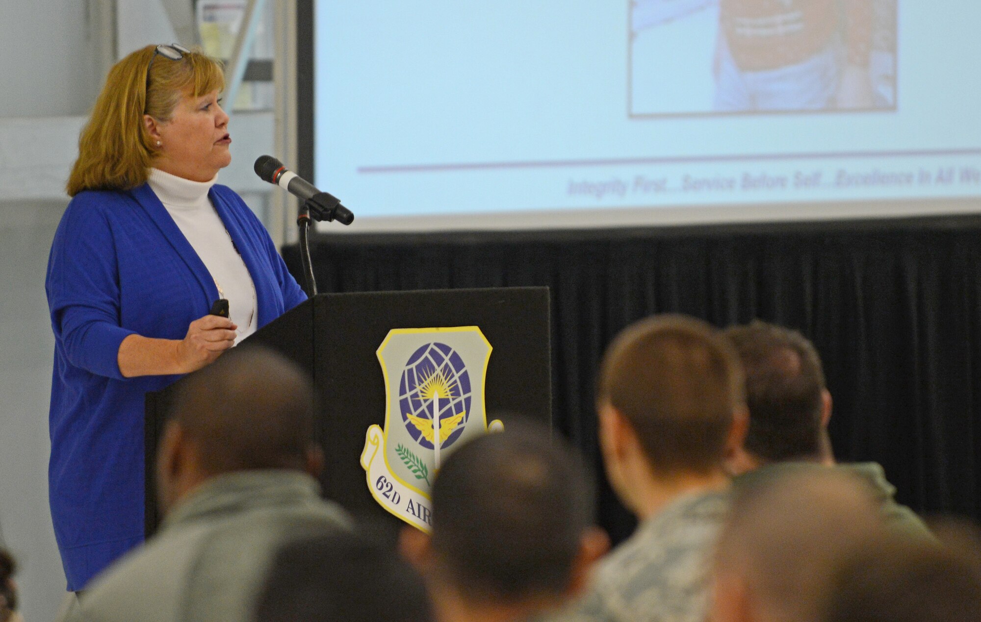 Jeanne Morrow, 62nd Airlift Wing community support coordinator, speaks with Team McChord Airmen during Wingman Day Nov. 18, 2016 at Joint Base Lewis-McChord, Wash. Morrow spoke to Airmen about holidays and impulsivity and she encouraged all Airmen to enjoy the upcoming holidays and to be safe. (U.S. Air Force photo/Senior Airman Divine Cox)