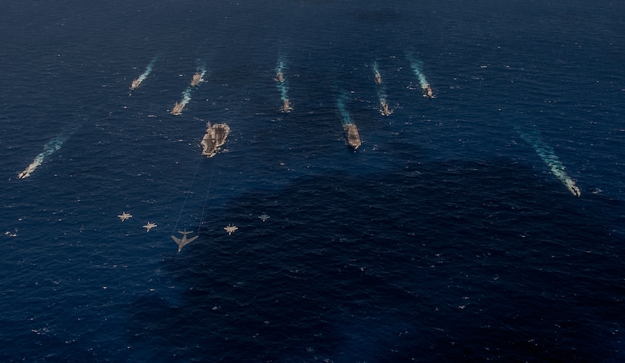 A B-1 bomber from the 34th Expeditionary Bomb Squadron leads a formation with fighters in front of U.S. Navy and Japanese surface vessels during Exercise Keen Sword 17, which took place Oct. 30 to Nov. 11, 2016, in the Pacific Ocean off the coasts of Japan, Guam and the Northern Mariana Islands. Keen Sword is a bilateral exercise between the Japanese Self-Defense Force and the United States designed to strengthen the Japan-U.S. alliance and increase combined combat readiness within the framework of the alliance. (U.S. Navy photo by MC3 Nathan Burke)