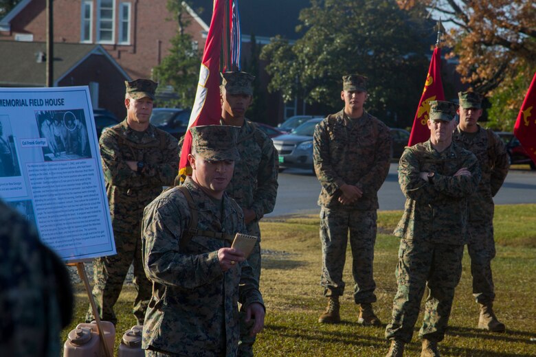 U.S. Marine Corps Staff Sgt. Markus Green, front left, career planner, Headquarters and Support Battalion (H&S Bn), Marine Corps Installations East, Marine Corps Base Camp Lejeune (MCIEAST, MCB CAMLEJ) gives a period of military instruction during a hike on Camp Lejeune, Nov. 14, 2016. H&S Bn, MCIEAST, MCB CAMLEJ conducted a 7.5 mile motivational and educational hike in recognition of the 75th anniversary of Camp Lejeune.