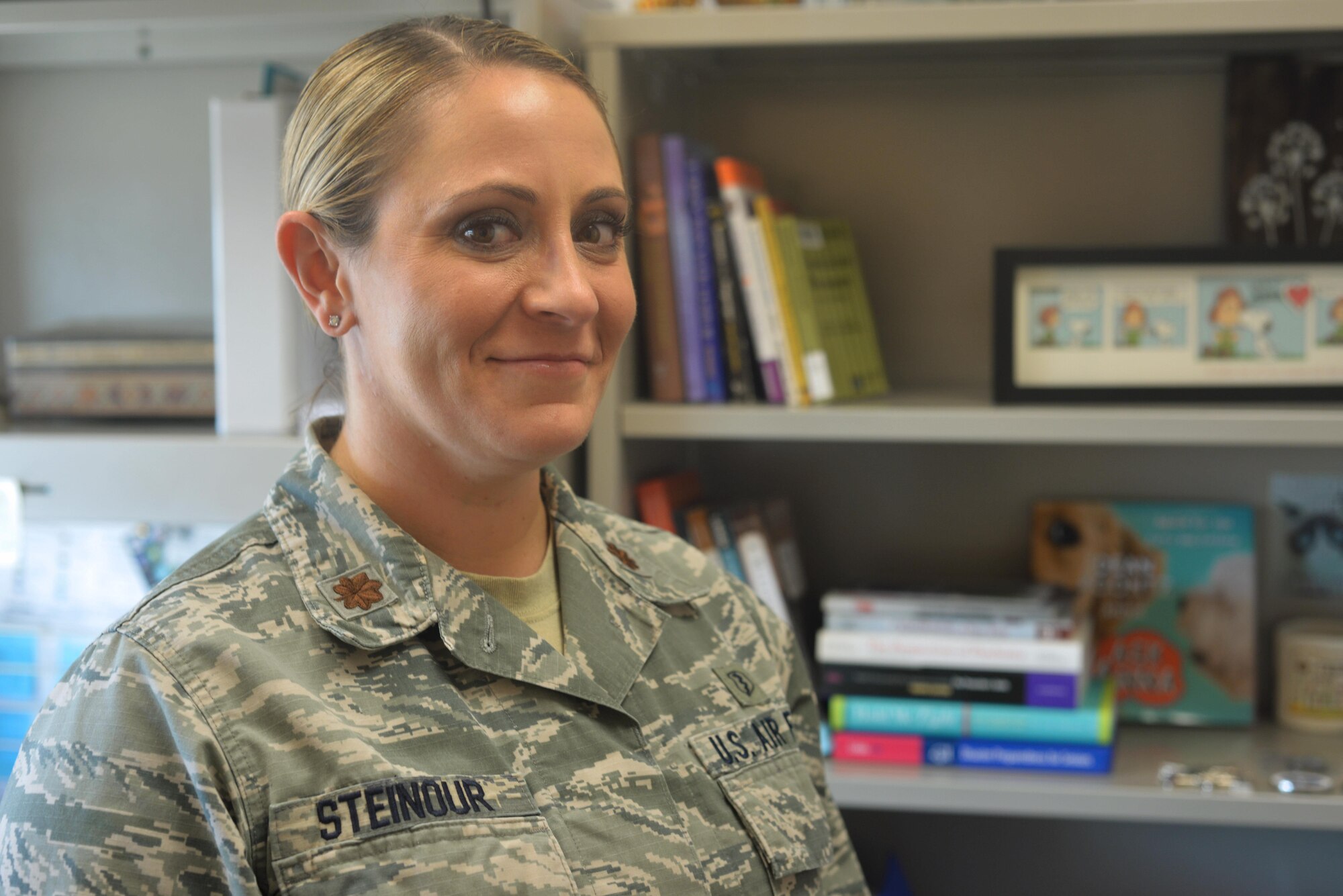 Maj. Meghan Steinour poses for a photo in her office at the 9th Medical Group clinic on Beale Air Force Base, Novemeber 9, 2016. (U.S. Air Force photo/Senior Airman Benjamin Bugenig)
