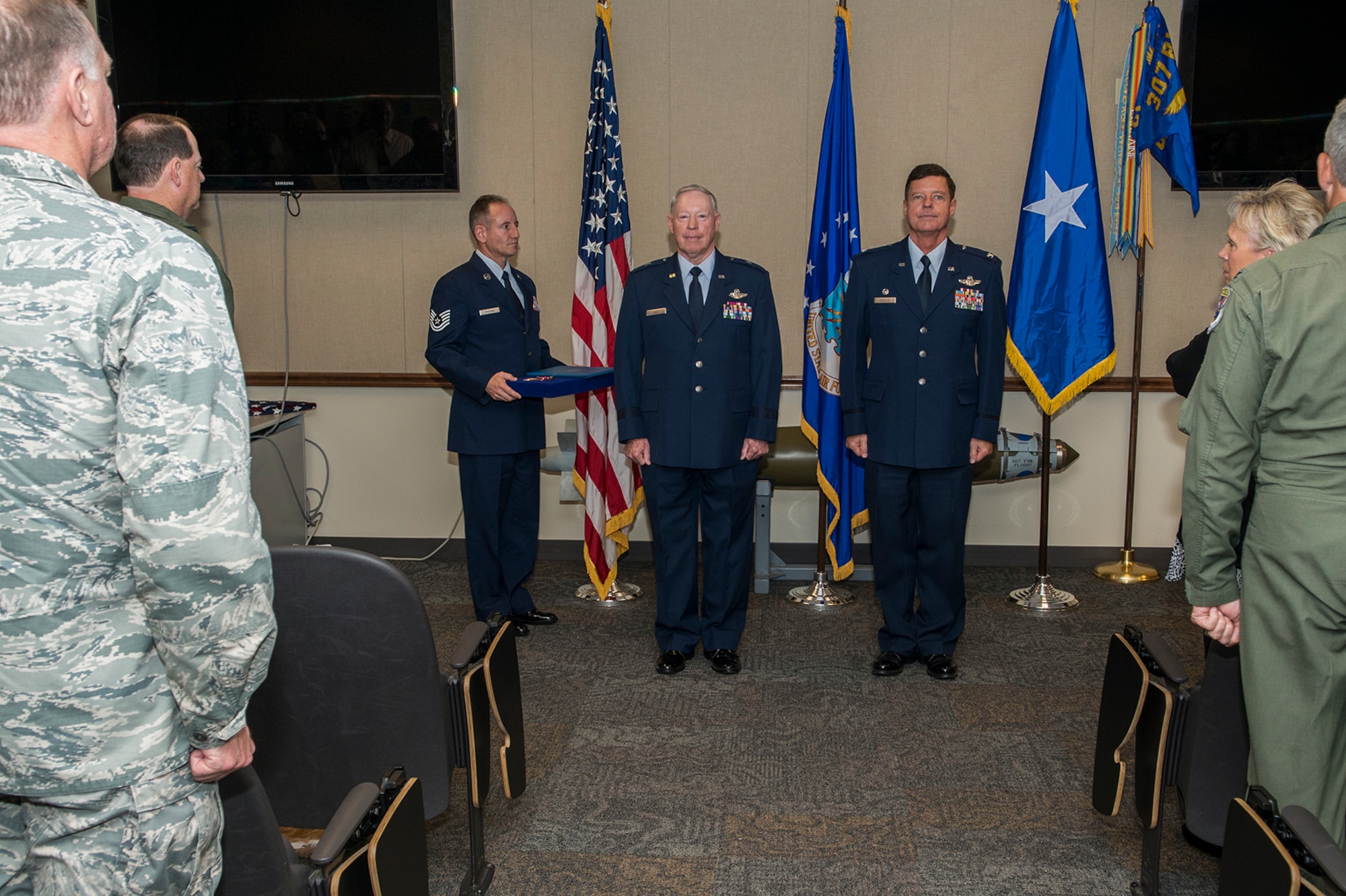 A retirement ceremony is held for Col. Keith Schultz (right) on Nov. 18, 2016, Barksdale Air Force Base, La. Schultz is the former 307th Operations Group commander and is retiring after serving over 30 years in the Air Force. (U.S. Air Force photo by Master Sgt. Greg Steele/Released)