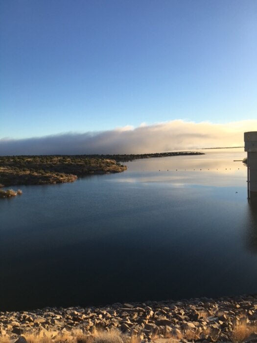 SANTA ROSA LAKE, N.M. – Fog drifts along part of the dam, April 13, 2016. Photo by Rowena Sanchez. This was a 2016 Photo Drive entry. 