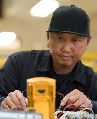 After working 28 years as an aerospace ground equipment mechanic, Ronnie Leonen knows how to fix just about all the 53 different types of equipment at the 60th Aerospace Ground Equipment Flight. Whether it’s running a simple test on circuit board, or helping less experienced Airmen learn something new, he and other civilians in the shop provide experience and continuity that help their unit provide reliable, 24/7 support to the 60th Air Mobility Wing and 349th AMW at Travis Air Force Base, Calif. (U.S. Air Force photo by Ken Wright)