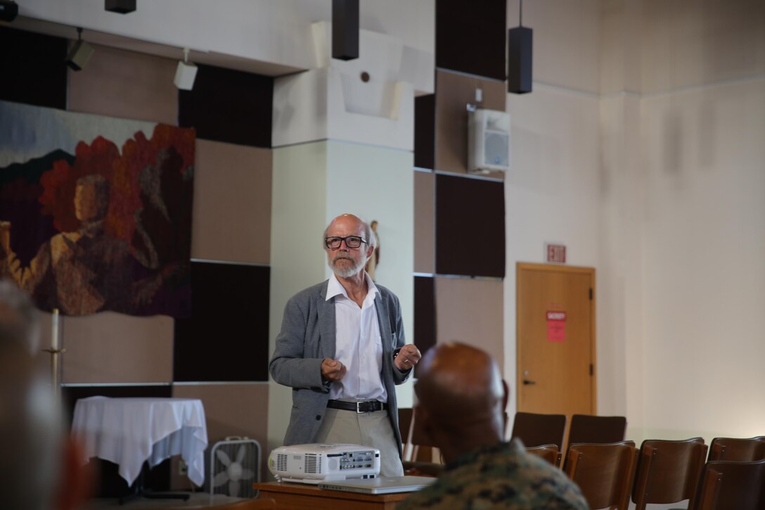 Dr. David Dozier, a communications professor with San Diego State University, answers questions during “When Cancer Calls” at Marine Corps Base Camp Pendleton, Calif., Nov. 17, 2016. The seminar was open to all Marines, Sailors and family members who have been affected by cancer and featured a film detailing one family’s struggle with cancer and how they dealt with its emotional impact. (U.S. Marine Corps photo by Pfc. Robert Bliss)