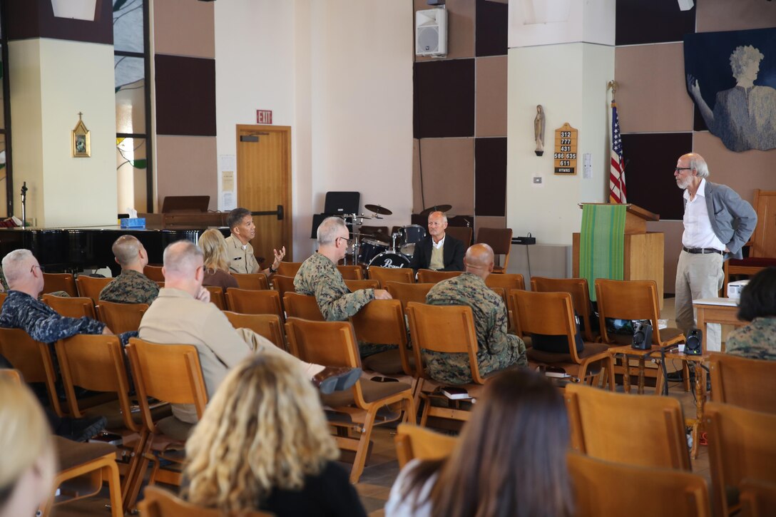 Dr. David Dozier, a communications professor with San Diego State University, answers questions during “When Cancer Calls” at Marine Corps Base Camp Pendleton, Calif., Nov. 17, 2016. The seminar was open to all Marines, Sailors and family members who have been affected by cancer and featured a film detailing one family’s struggle with cancer and how they dealt with its emotional impact. (U.S. Marine Corps photo by Pfc. Robert Bliss)