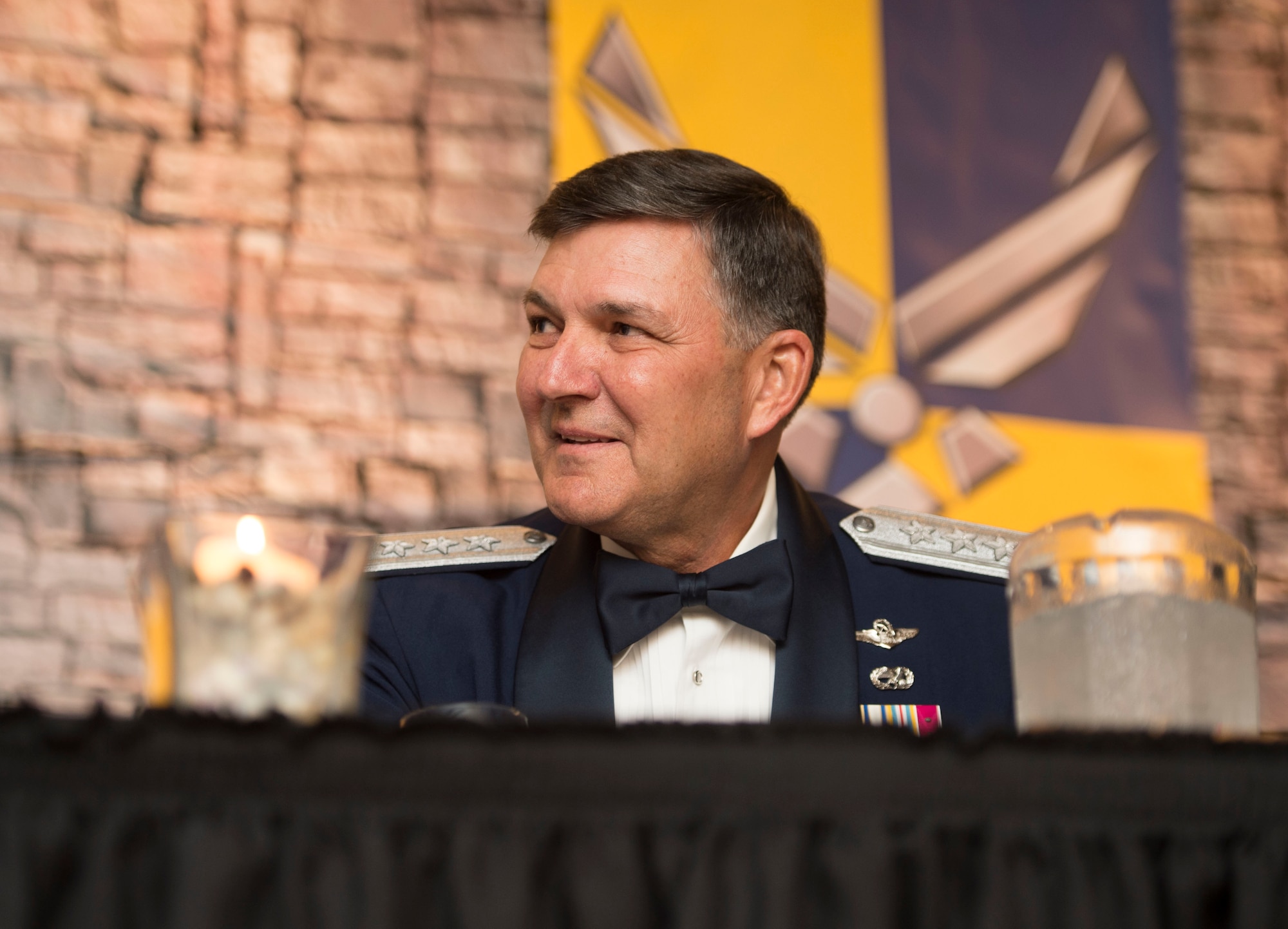 Lt. Gen. Brad Heithold, the former commander of the Air Force Special Operations Command, smiles while watching a video dedication to him during the Order of the Sword ceremony at Hurlburt Field, Fla., Nov. 18, 2016. Heithold is the tenth officer inducted into Air Force Special Operations Command’s Order of the Sword what?. (U.S. Air Force photo by Senior Airman Krystal M. Garrett)