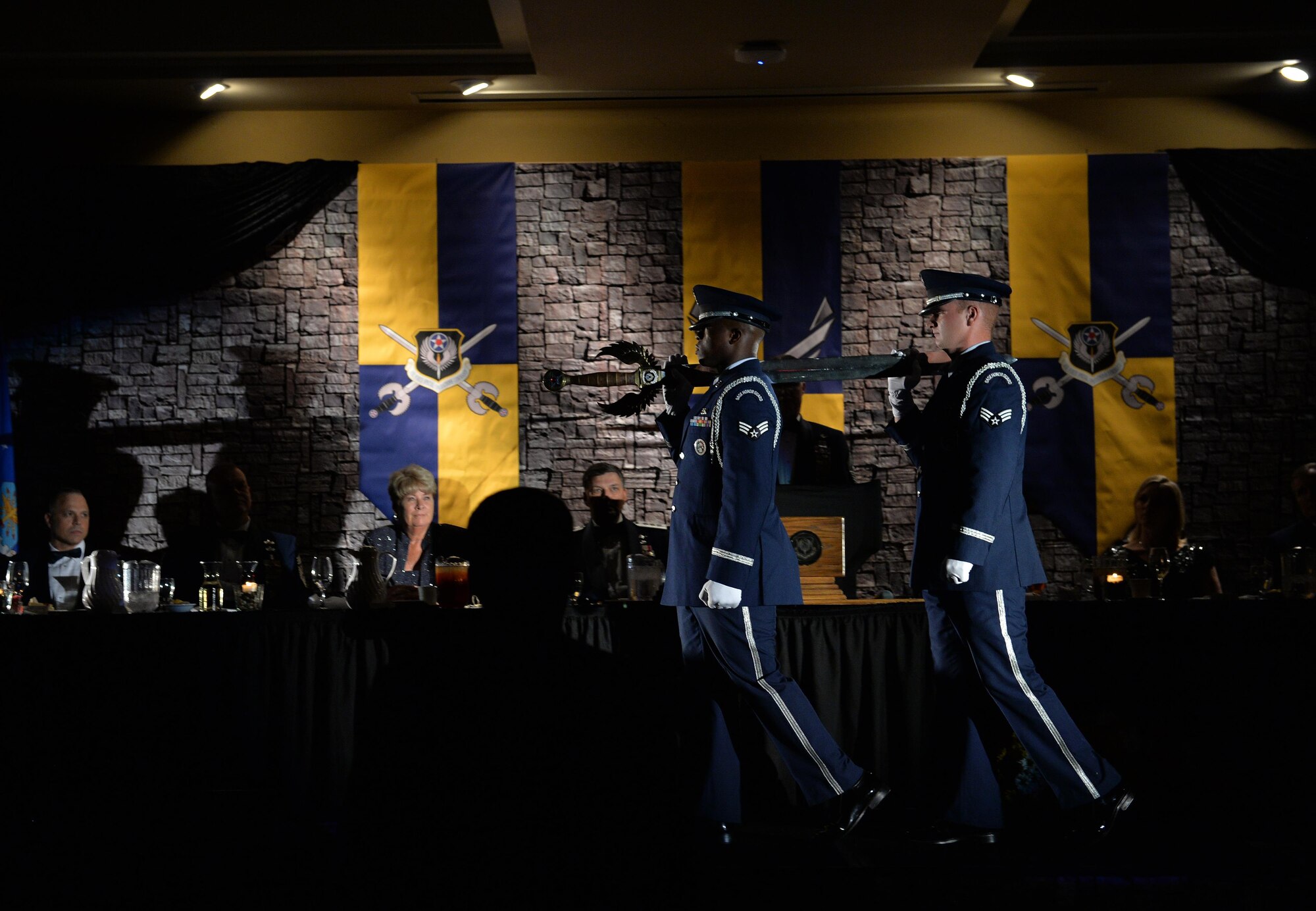 Hurlburt Field Honor Guard members carry the sword used for the Order of the Sword ceremony at Hurlburt Field Fla., Nov. 18, 2016. The Order of the Sword is the highest and most prestigious award that can be given to an officer by enlisted military members. (U.S. Air Force photo by Senior Airman Andrea Posey)
