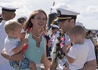 JOINT BASE PEARL HARBOR-HICKAM, Hawaii (Nov. 18, 2016) Lt. William Spears, from Pineville, Louisiana, assigned to the Los Angeles-class fast-attack submarine USS Columbia (SSN 771), is greeted by his wife and childen following the completion of a six-month deployment to the Western Pacific Ocean. (U.S. Navy photo by Petty Officer 2nd Class Michael H. Lee)