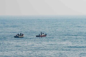 ARABIAN GULF (Nov. 18, 2016) - Sailors assigned to the guided-missile destroyer USS Nitze (DDG 94) render assistance to a distressed Iranian vessel. Nitze, deployed as part of the Eisenhower Carrier Strike Group, is supporting maritime security operations and theater security cooperation efforts in the U.S. 5th Fleet area of operations. 