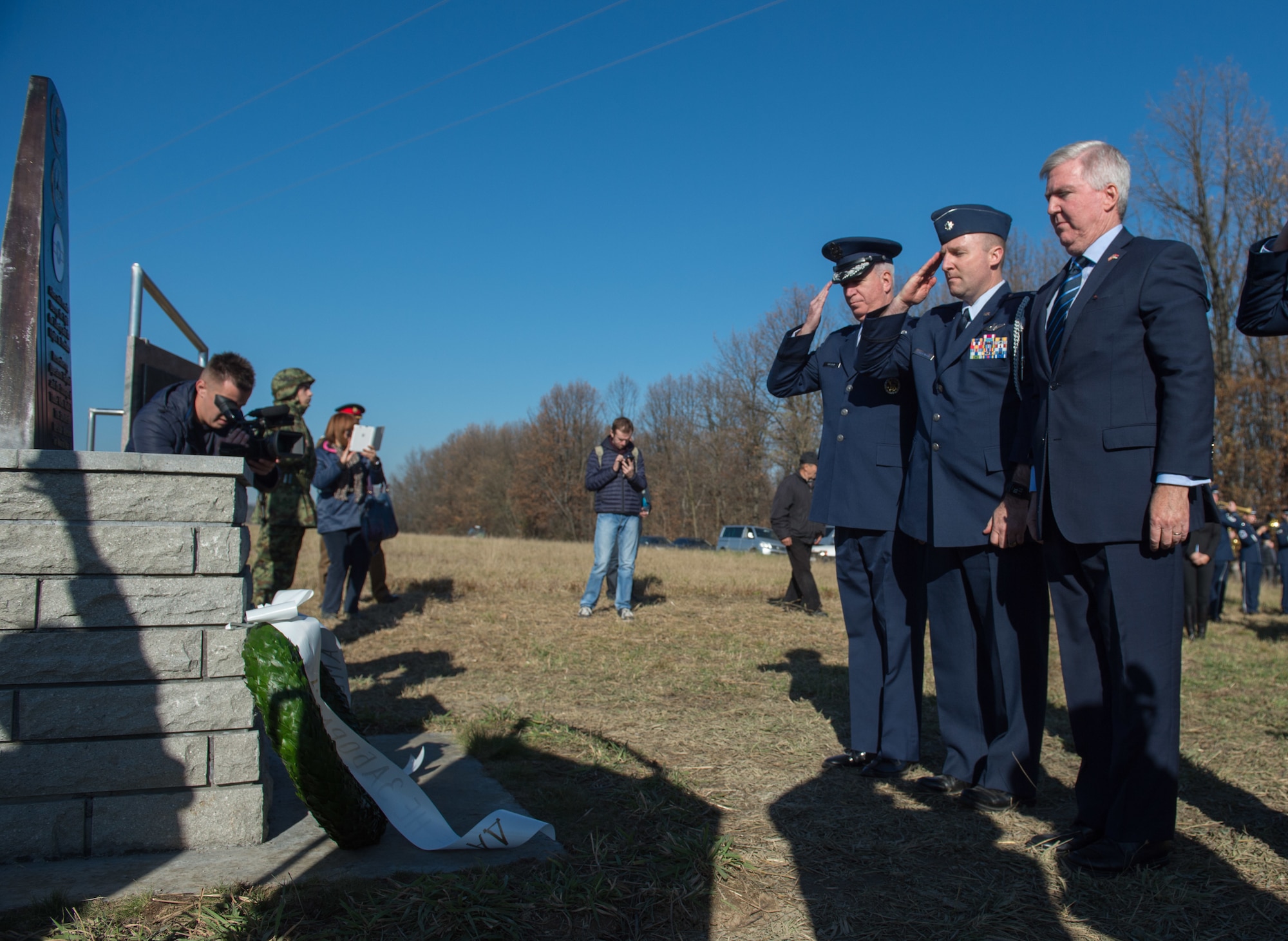 Kyle Scott, U.S Ambassador to Serbia (right), Lt. Col. Todd Andrewsen (center), and Brig. Gen. Randy Huston (left) preset a wreath at the Operation Halyard memorial in Pranjani, Serbia, Nov. 17, 2016. The U.S. State Department, U.S. Air Force, Royal Air Force and Serbian Armed Forces were in attendance to commemorate the event and the heroic actions of the Serbian people. Operation Halyard was the rescue mission to save more than 500 Allied Airmen who were shot down over Serbia during WWII. The local Serbians housed and fed the downed Airmen, while also keeping their presence a secret from the German forces searching for them. The operation was, and still is, the largest rescue of downed Americans. (U.S. Air Force photo by Tech. Sgt. Ryan Crane)