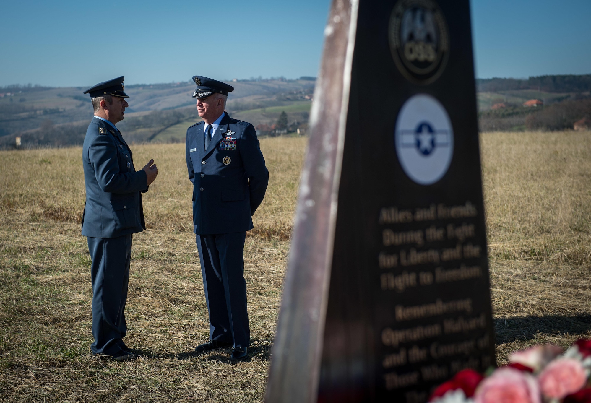 Brig. Gen. Randy Huston, 3rd Air Force mobilization assistant, speaks to his Serbian Armed Forces counterpart at the Operation Halyard memorial in Pranjani, Serbia, Nov. 17, 2016.  The U.S. State Department, U.S. Air Force, Royal Air Force and Serbian Armed Forces were in attendance to commemorate the event and the heroic actions of the Serbian people. Operation Halyard was the rescue mission to save more than 500 Allied Airmen who were shot down over Serbia during WWII. The local Serbians housed and fed the downed Airmen, while also keeping their presence a secret from the German forces searching for them. The operation was, and still is, the largest rescue of downed Americans. (U.S. Air Force photo by Tech. Sgt. Ryan Crane)