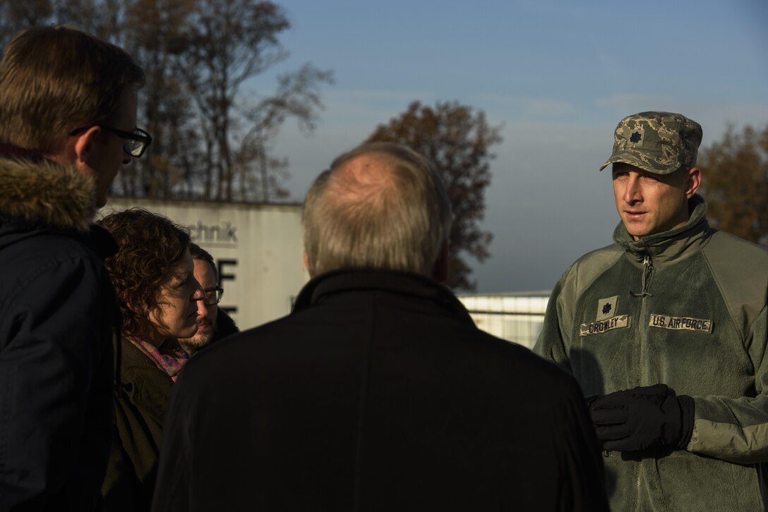 Sabine Metzen, 52nd Civil Engineer Squadron project manager, shows 52nd Fighter Wing leadership and school leadership around the new modular buildings being built on Spangdahlem Air Base, Germany, Nov. 14, 2016. The design and execution of the elementary school expansion project was a collaborative effort between Depart of Defense Education Activity, school leadership and 52nd CES. (U.S. Air Force photo by Staff Sgt. Jonathan Snyder)