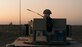 Senior Airman Anthony Wachob, a member of the 821st Contingency Response Group, radios in from a defensive fighting position while on perimeter watch at Qayyarah West Airfield, Iraq, Nov. 17, 2016. The 821st CRG is highly specialized in training and rapidly deploying personnel to quickly open airfields and establish, expand, sustain and coordinate air mobility operations in austere, bare-base conditions. (U.S. Air Force photo/Senior Airman Jordan Castelan)