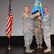 The 932nd Medical Group under 22nd Air Force, and the Air Force Reserve Command, has a new leader. The 932nd Airlift Wing commander, Col. Jonathan Philebaum, at left, is shown presenting the group's flag and welcoming the new commander of the 932nd Medical Group, Col. Leon Barringer, to the Illinois base during an assumption of command event on November 6, 2016. (U.S. Air Force photo by Lt. Col. Stan Paregien)