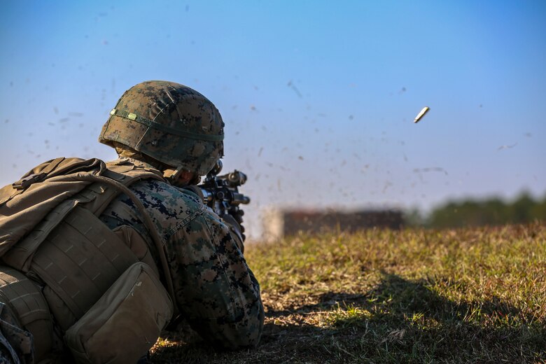 Lance Cpl. William Finn fires an M4 Carbine rifle during a training exercise at Camp Lejeune, N.C., Nov 16, 2016. The Marines practiced squad-sized movements in order to maintain unit readiness for their upcoming Integrated Training Exercise at the Marine Corps Air Ground Combat Training Center in Twentynine Palms, California. Finn is a grenadier with 1st Battalion, 8th Marine Regiment.  (U.S. Marine Corps Photo by Lance Cpl. Jon Sosner)
