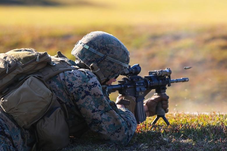 Lance Cpl. Derek Perez-Pantoja fires an M4 Carbine rifle during a training exercise at Camp Lejeune, N.C., Nov 16, 2016. The Marines practiced squad-sized movements in order to maintain unit readiness for their upcoming Integrated Training Exercise at the Marine Corps Air Ground Combat Training Center in Twentynine Palms, California. Perez-Pantoja is a rifleman with 1st Battalion, 8th Marine Regiment.  (U.S. Marine Corps Photo by Lance Cpl. Jon Sosner)