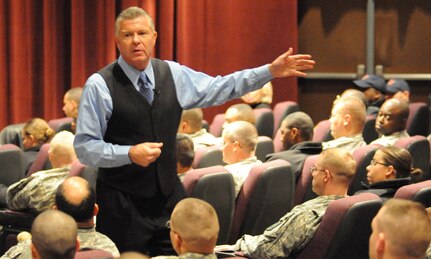 Post-traumatic stress expert and motivational speaker Bob Delaney, also known for his professional officiating with the National Basketball Association and undercover detective work as a New Jersey State policeman, speaks during a recent visit to Fort Wainwright, Alaska. 
