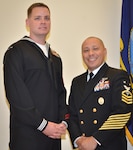 Petty Officer 1st Class Cameron Graham (left), Hospital Corps “A” School instructor at Joint Base San Antonio-Fort Sam Houston, poses for a photo with Master Chief Petty Officer Tony Guzman, Navy Medicine Training Support Center’s senior enlisted adviser, after Graham was announced as Navy Medicine Education, Training and Logistics Command, or NMETLC, Sailor of the Year for 2016 during a ceremony at JBSA-Fort Sam Houston Nov. 17. Graham will represent NMETLC at Navy Medicine’s Sailor of the Year competition in January.
