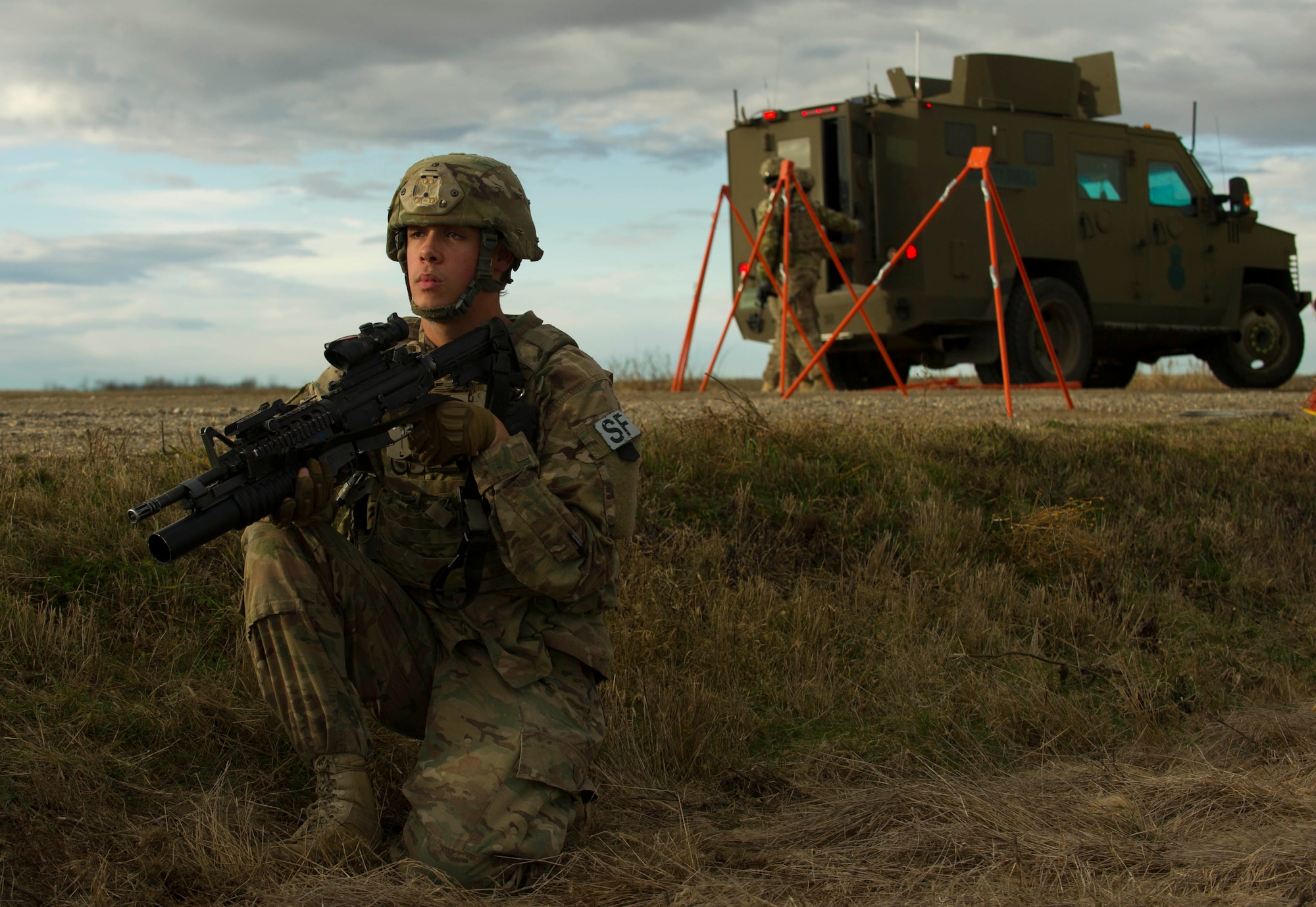 Senior Airman Brandon Thompson, 791st Missile Security Forces Squadron defender, provides security during a recapture and recovery exercise at the missile complex, N.D., Nov. 16, 2016. During the simulated scenario, Thompson and other defenders secured an area, while others recovered the asset, which was taken over by hostile forces. (U.S. Air Force photo/Senior Airman Apryl Hall)