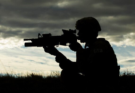 Senior Airman Brandon Thompson, 791st Missile Security Forces Squadron defender, provides security during a recapture and recovery exercise at the missile complex, N.D., Nov. 16, 2016. During the scenario, simulated hostile forces took control of a payload transporter and the defenders responded and recovered the asset. (U.S. Air Force photo/Senior Airman Apryl Hall)