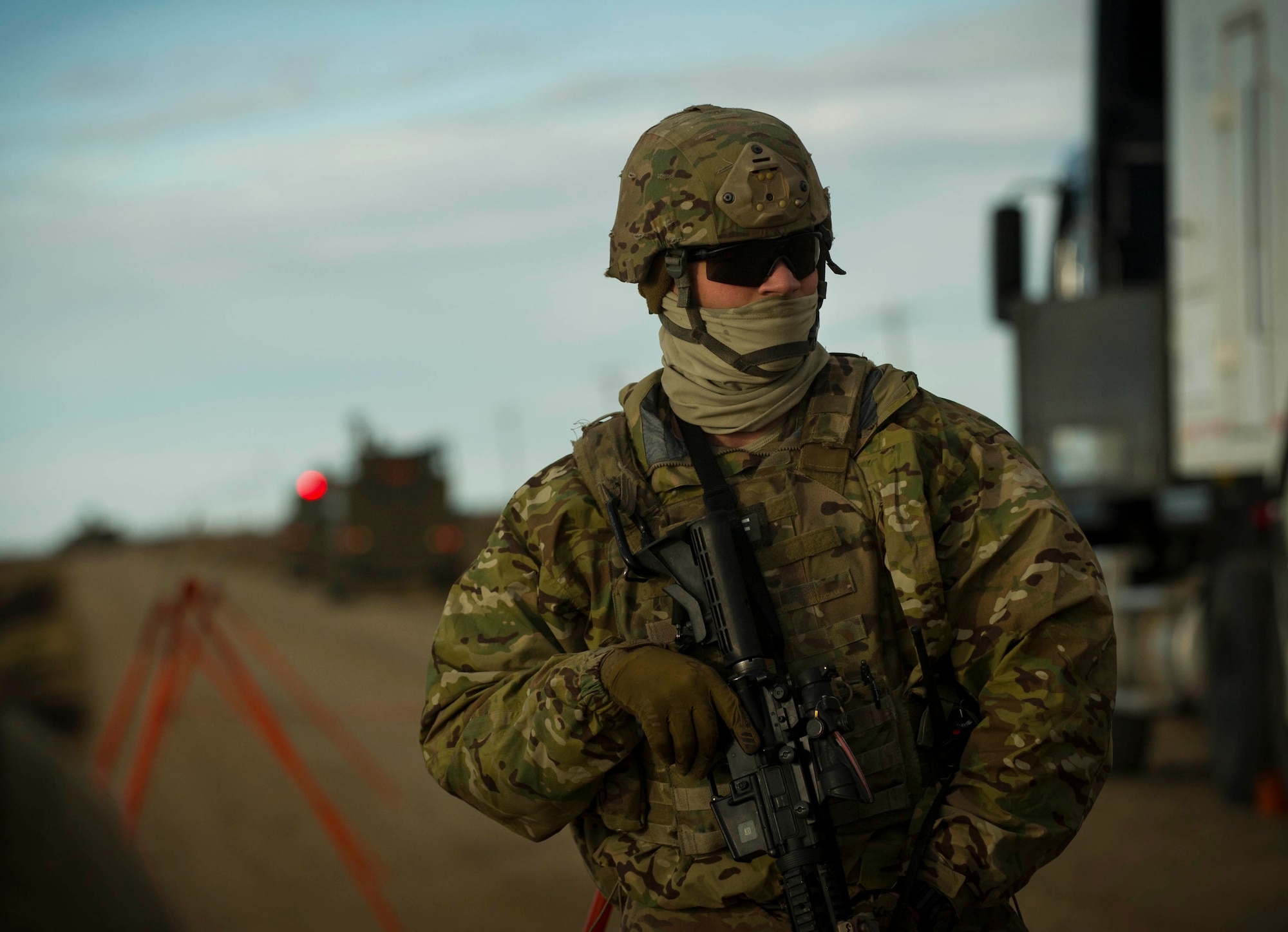Senior Airman Dustin Silc, 791st Missile Security Forces Squadron convoy response force member, listens to directions from his team-lead during a recapture and recovery exercise at the missile complex, N.D., Nov. 16, 2016. During the simulated scenario, Silc secured and recovered an asset that was taken over by hostile forces. (U.S. Air Force photo/Senior Airman Apryl Hall)