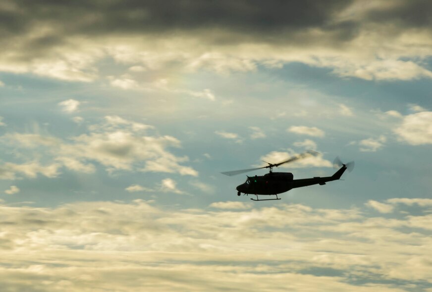 Members from the 54th Helicopter Squadron fly overhead during a recapture and recovery exercise at the missile complex, N.D., Nov. 16, 2016. The 54th HS provided air support during the scenario, which simulated hostile forces taking over a payload transporter. (U.S. Air Force photo/Senior Airman Apryl Hall)