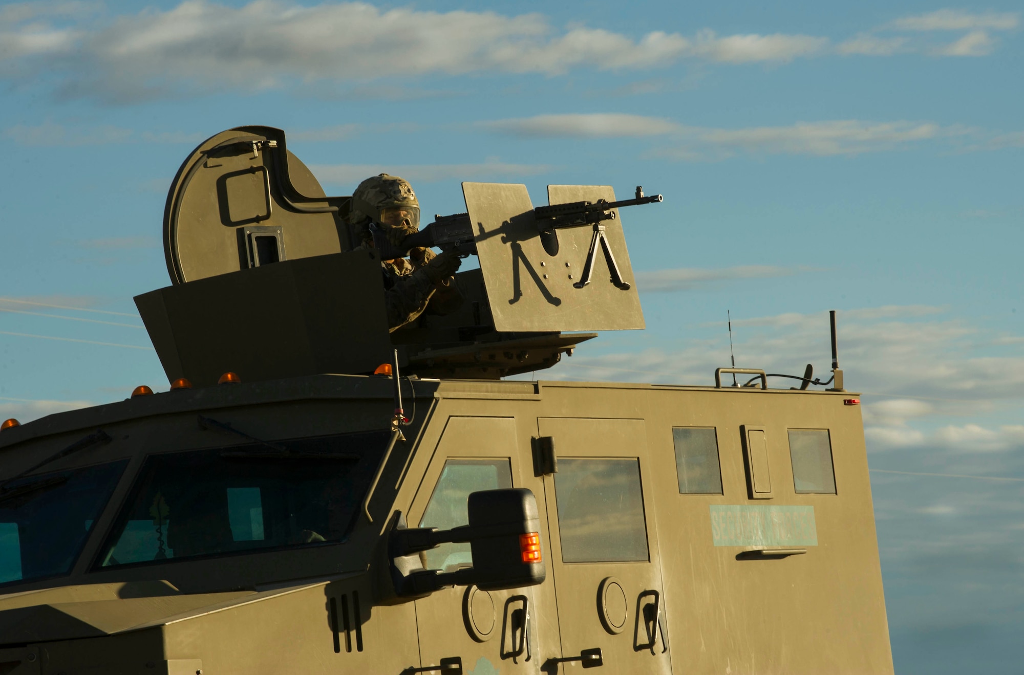A defender from the 791st Missile Security Forces Squadron provides security during a recapture and recovery exercise at the missile complex, N.D., Nov. 16, 2016. During the simulated scenario, defenders recovered an asset that was taken over by hostile forces. (U.S. Air Force photo/Senior Airman Apryl Hall)
