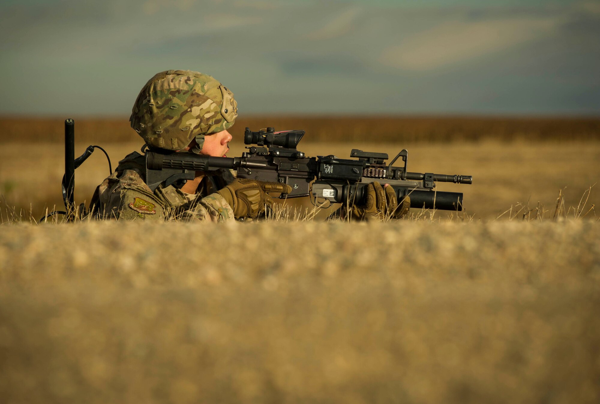 Senior Airman Brandon Thompson, 791st Missile Security Forces Squadron defender, provides security during a recapture and recovery exercise at the missile complex, N.D., Nov. 16, 2016. During the simulated scenario, defenders set up a security perimeter to watch for hostile forces. (U.S. Air Force photo/Senior Airman Apryl Hall)