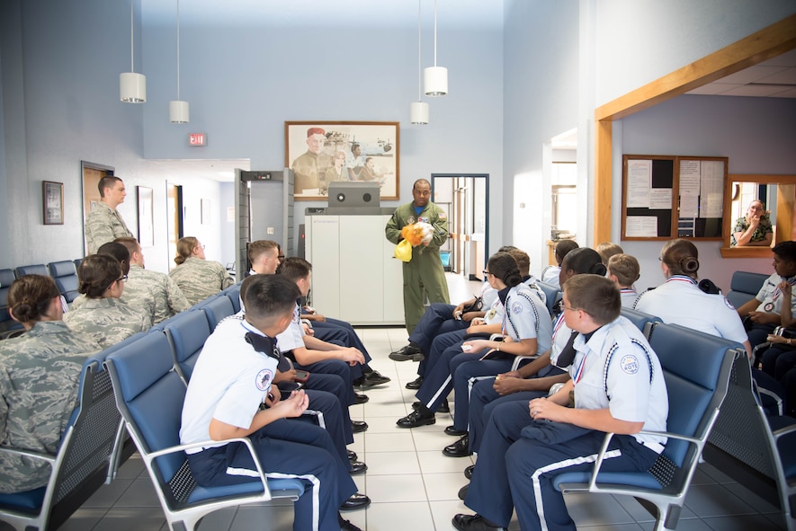 Staff Sgt. Larry Banks, 53rd Weather Reconnaissance Squadron loadmaster, breifs the Biloxi High School JROTC team about safety procedures before a flight on a WC-130J Super Hurcules aircraft. The JROTC team won the Mississippi All Services JRTOC Drill Competition Nov. 18 at Keesler Air Force Base, Miss. and had a chance to fly with the 53rd Weather Reconnaissance Squadron Hurricane Hunters to learn more about the mission of the Air Force Reserve. (U.S. Air Force photo/Staff Sgt. Heather Heiney) 