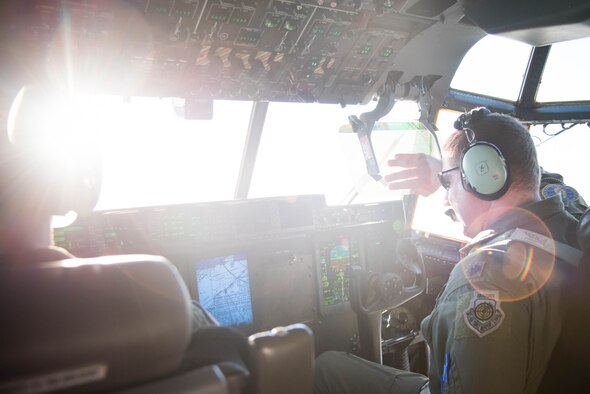 An Air Force Reserve pilot blocks the sun during an incentive flight for the Biloxi High School JROTC team. The team won the Mississippi All Services JRTOC Drill Competition Nov. 18 at Keesler Air Force Base, Miss. and had a chance to fly with the 53rd Weather Reconnaissance Squadron Hurricane Hunters to learn more about the mission of the Air Force Reserve. (U.S. Air Force photo/Staff Sgt. Heather Heiney) 