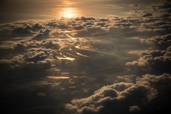 The sun sets along the Mississippi coast during an incentive flight for the Biloxi High School JROTC team. They won the Mississippi All Services JRTOC Drill Competition Nov. 18 at Keesler Air Force Base, Miss. and had a chance to fly with the 53rd Weather Reconnaissance Squadron Hurricane Hunters to learn more about the mission of the Air Force Reserve. (U.S. Air Force photo/Staff Sgt. Heather Heiney) 
