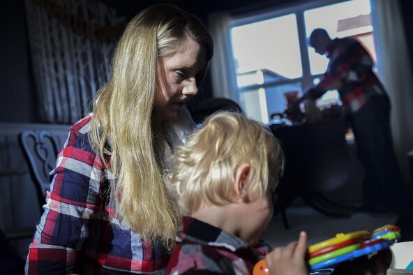 Mandy Douglas plays with her son, Dean, Nov. 2, 2016, at their family home in Colorado Springs, Colo. While her husband works at Peterson Air Force Base, Colo. Mandy stays at home with their 3-year-old twin boys to take them to doctor’s appointments, take care of their daily routines and maintain the house. Dean and Luke were both born premature at 23 weeks. (U.S. Air Force photo/Airman 1st Class Gabrielle Spradling)
