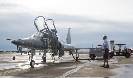 Chris Bahe, 12th Flying Training Wing T-38C Talon II crew chief, prepares to do a pre-flight walk-around inspection of a T-38C before a pilot is cleared for flight at Joint Base San Antonio-Randolph Nov. 8, 2016. Bahe has been a crew chief at JBSA-Randolph since 2007. (U.S. Air Force photo by Airman 1st Class Lauren Ely/Released)