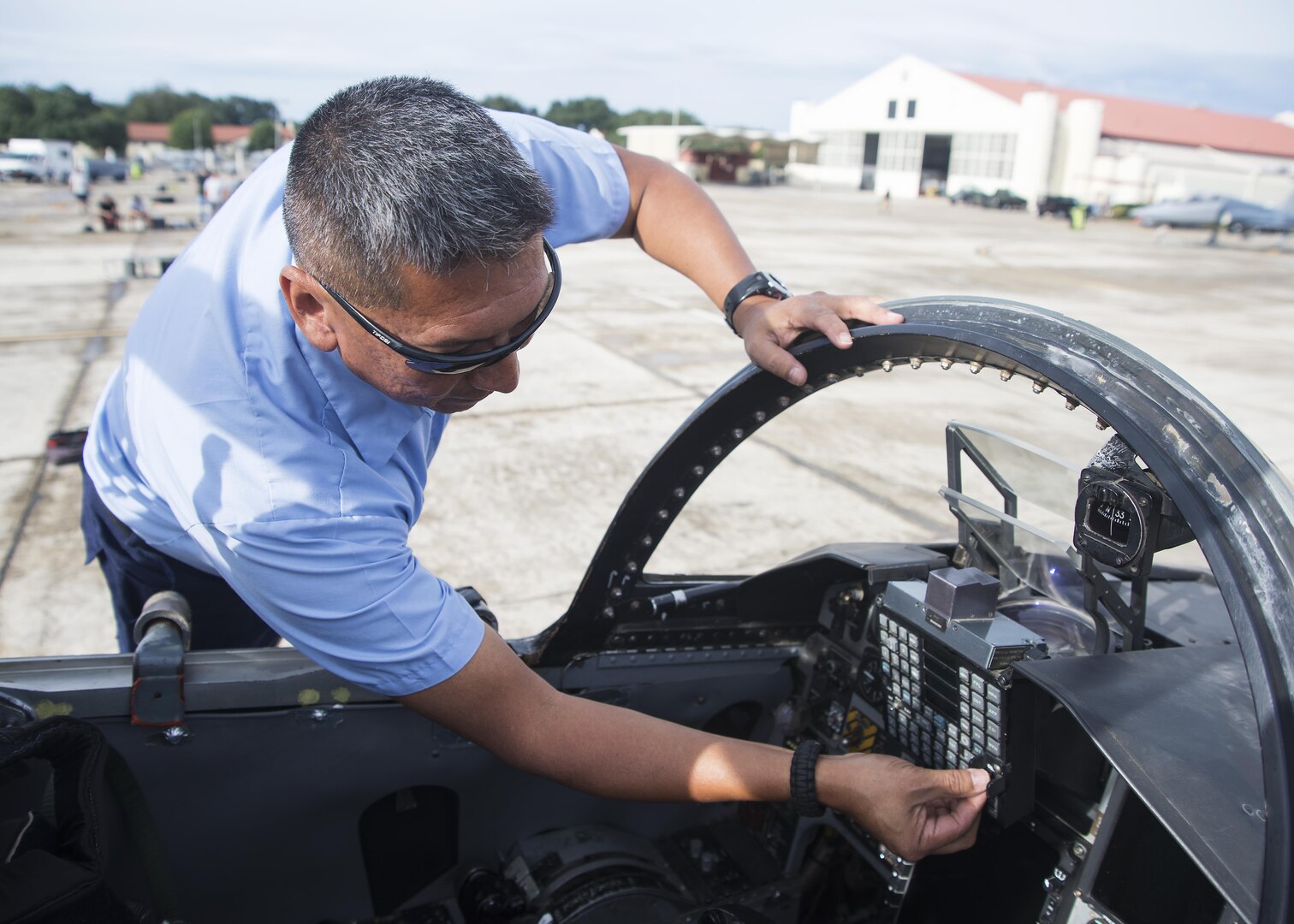Chris Bahe, 12th Flying Training Wing T-38C Talon II crew chief, tests the switches on a T-38C cockpit during a pre-flight inspection at Joint Base San Antonio-Randolph Nov. 8, 2016. Bahe performs a walk-around inspection before and after every flight. (U.S. Air Force photo by Airman 1st Class Lauren Ely/Released)