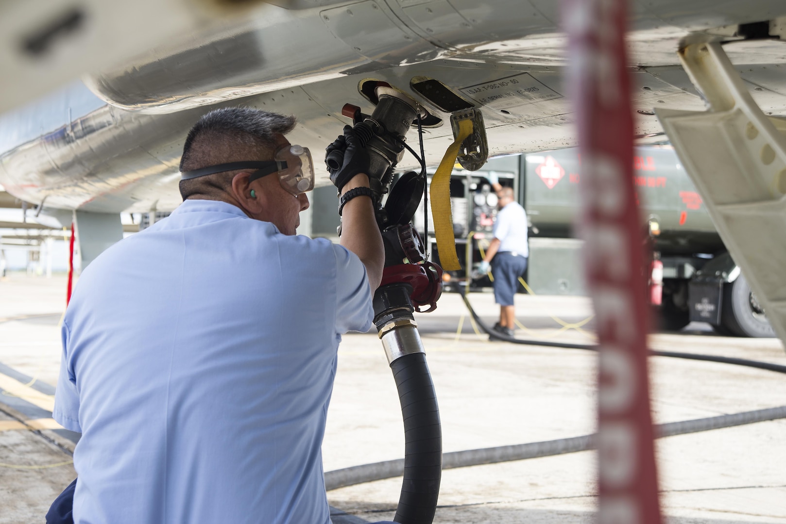 Chris Bahe, 12th Flying Training Wing T-38C Talon II crew chief, refuels a T-38C before a morning sortie at Joint Base San Antonio-Randolph Nov. 8, 2016. Bahe served 20 years in the Navy before becoming a crew chief with the 12th FTW. (U.S. Air Force photo by Airman 1st Class Lauren Ely/Released)