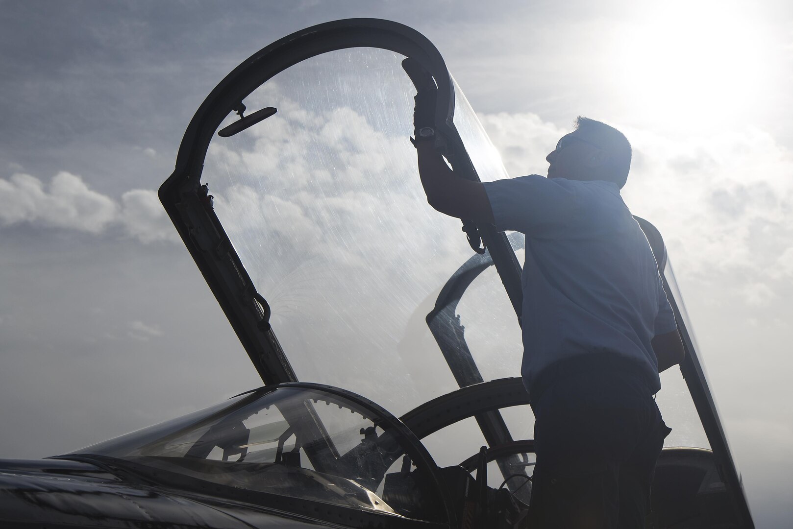 Chris Bahe, 12th Flying Training Wing T-38C Talon II crew chief, checks the canopy of a T-38C before it is cleared for flight at Joint Base San Antonio-Randolph Nov. 8, 2016. Bahe, who retired from the Navy, has also worked on A-6 Intruders, P-3 Orions, F-14 Tomcats and F-18 Hornets. (U.S. Air Force photo by Airman 1st Class Lauren Ely/Released)