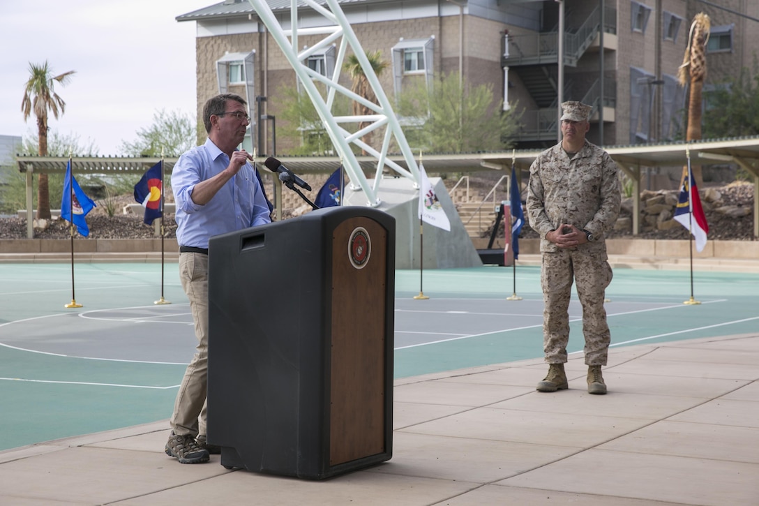 Defense Secretary Ash Carter addresses Marines and sailors at the Dunham Amphitheatre aboard Marine Corps Air Ground Combat Center, Twentynine Palms, Calif., Nov. 15, 2016. Carter visited the installation to observe a combined arms live-fire exercise (CALFEX), meet with Combat Center leadership, and address Marines and sailors stationed aboard the installation.   (Official Marine Corps photo by Lance Cpl. Dave Flores/Released)