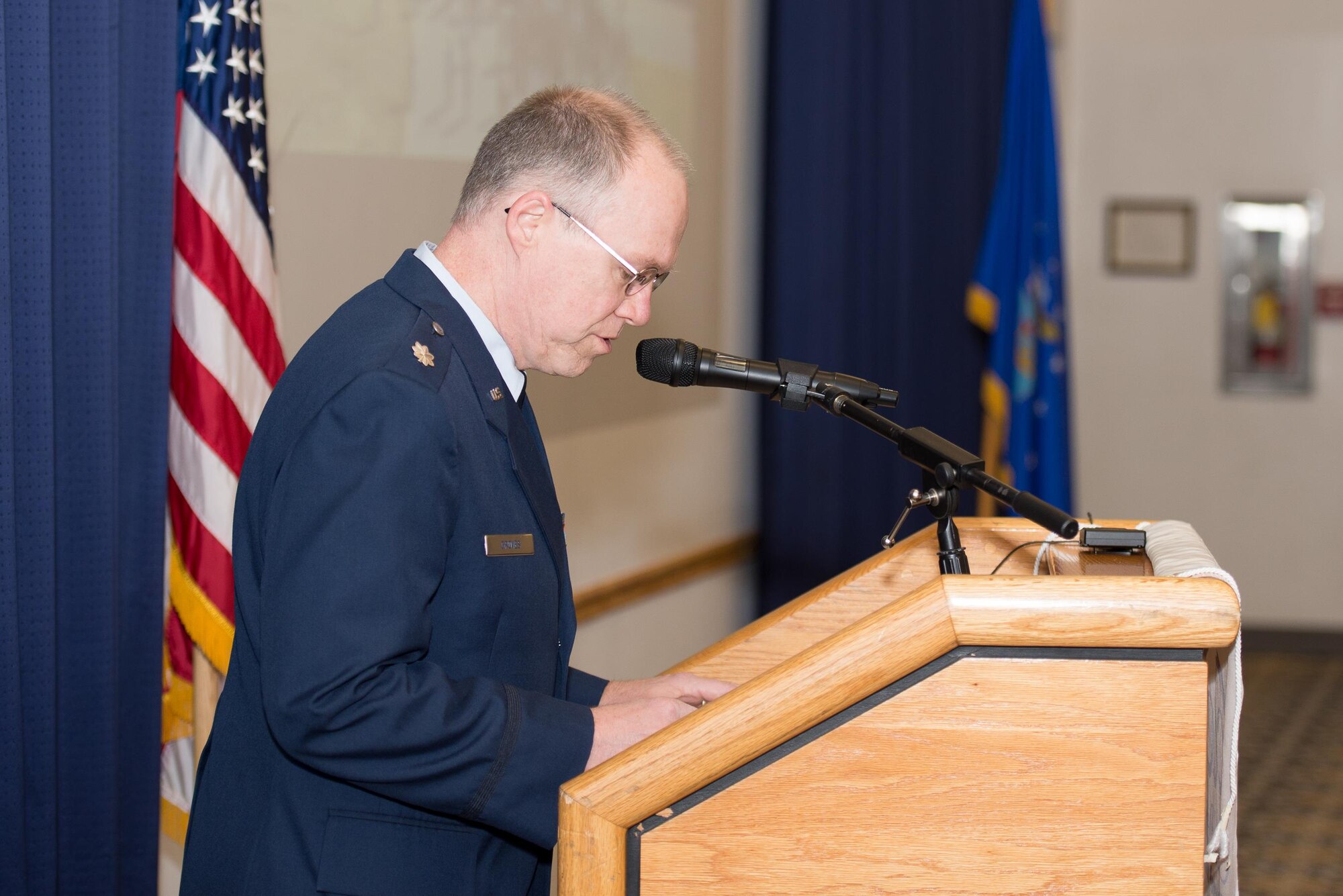 Lt. Col. Randall Groves, 436th Airlift Wing chaplain, gives the invocation at the 2016 Military Construction Breakfast Nov. 21, 2016, at the Landings on Dover Air Force Base, Del.  In addition to briefing attendees about Dover AFB, the brief also recognized several Team Dover members for their outstanding achievements throughout the year. (U.S. Air Force photo by Mauricio Campino)
