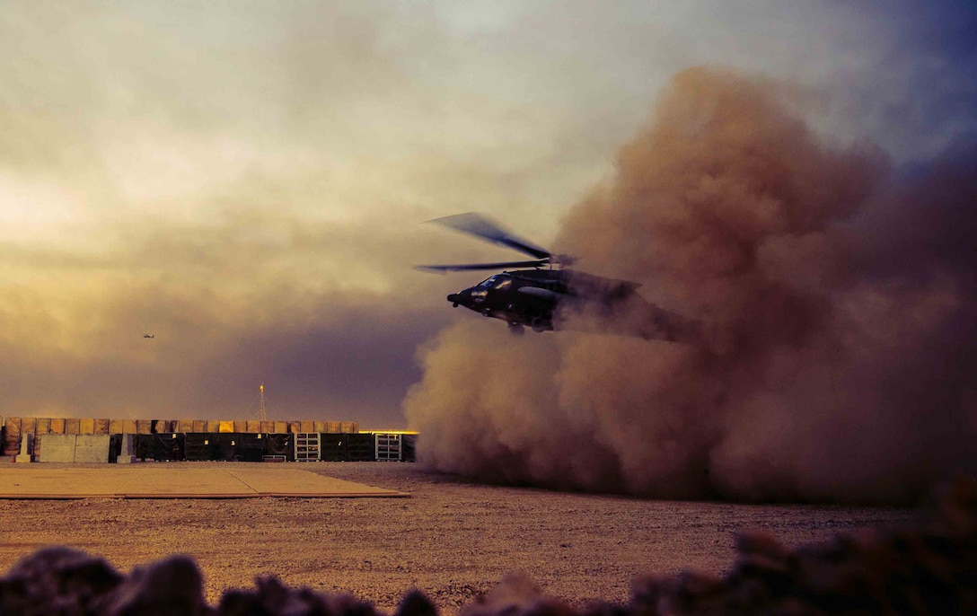 A U.S. Army UH-60Q Dustoff helicopter lands at Qayyarah West Airfield, Iraq, Nov. 19, 2016. The UH-60Q provides a 6 patient litter system, on-board oxygen generation, and a medical suction system. UH-60Q is a UH-60A derivative and incorporates approximate UH-60A characteristics. The UH-60Q delivers exceptional patient care, increased survivability, longer range, greater speed and added mission capability. (U.S. Air Force photo by Senior Airman Jordan Castelan)