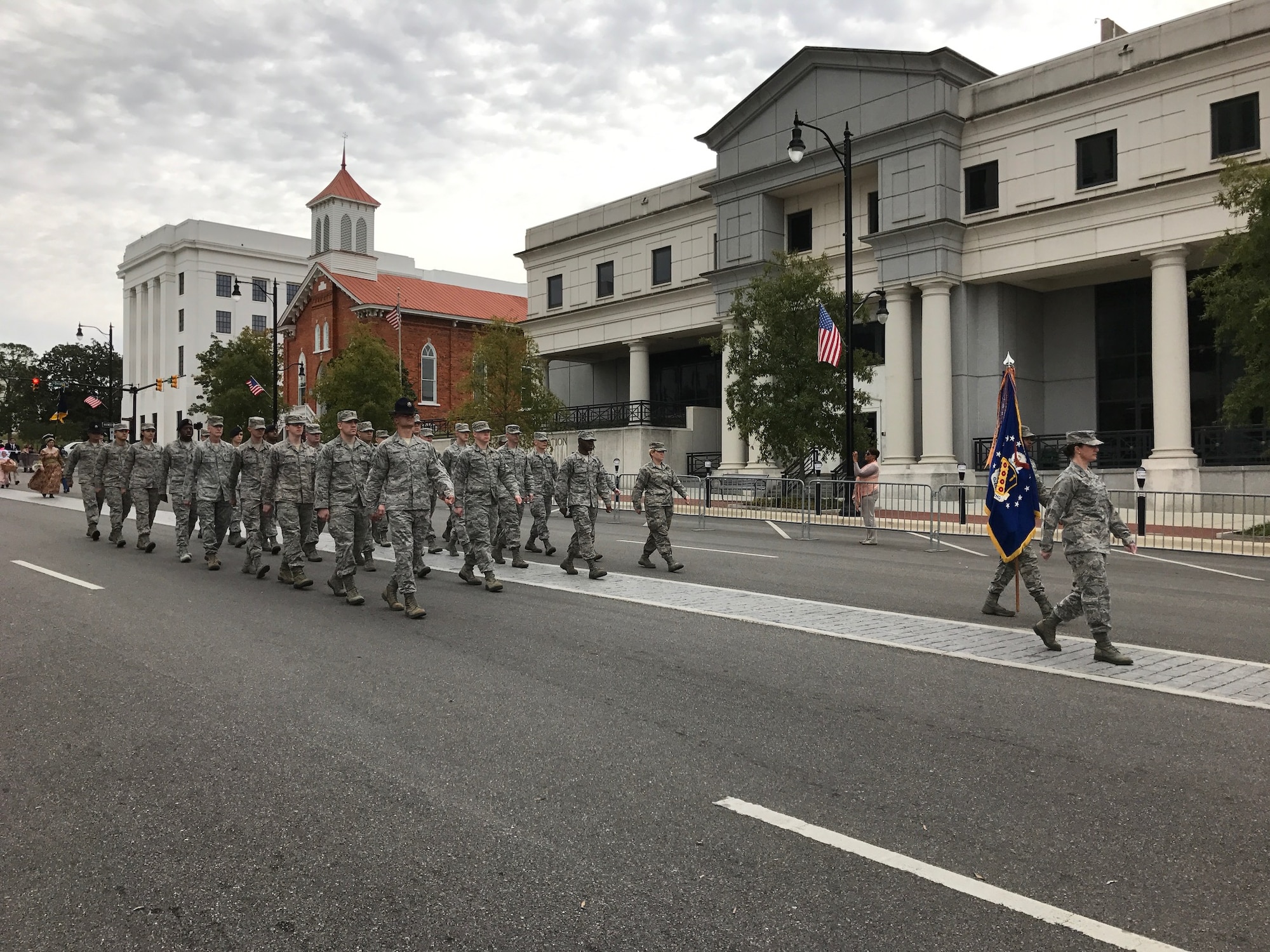 Airmen from Air University at Maxwell Air Force Base march in a Veterans Day parade Nov. 11, 2016 in downtown Montgomery, Ala. The parade was co sponsored by the Montgomery Area Chamber of Commerce and the American Legion Department of Alabama. (U.S. Air Force photo/Lt. Col. Mae-Li Allison